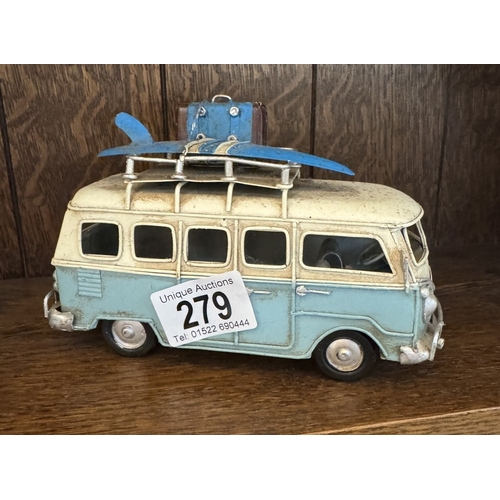 279 - A 1950s tinplate car & A retro steel model of a VW camper