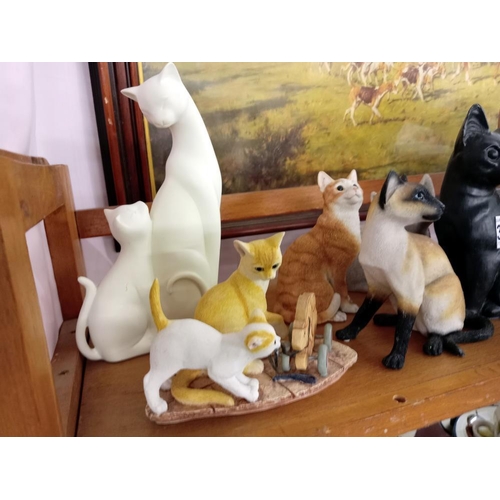 352 - A collection of cat ornaments