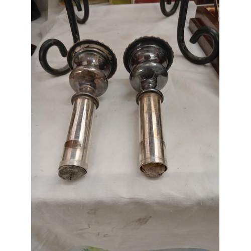 369 - A pair of old Sheffield plate candlesticks