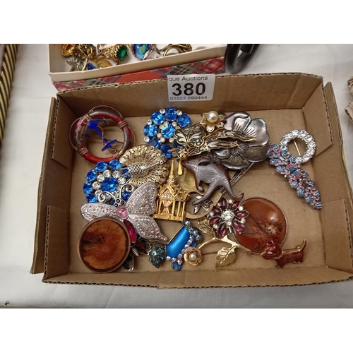 380 - A good lot of costume brooches