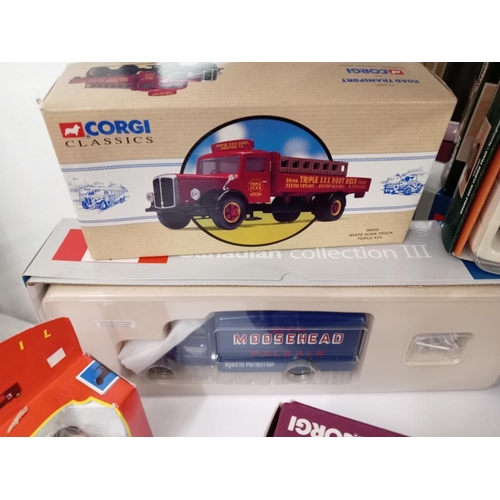 387 - A selection of die cast boxed vehicles