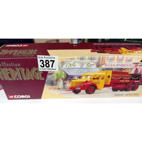 387 - A selection of die cast boxed vehicles