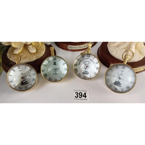 394 - 4 good globe paperweight watches