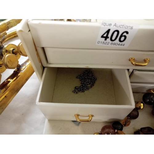 406 - A good quality jewellery box including jewellery