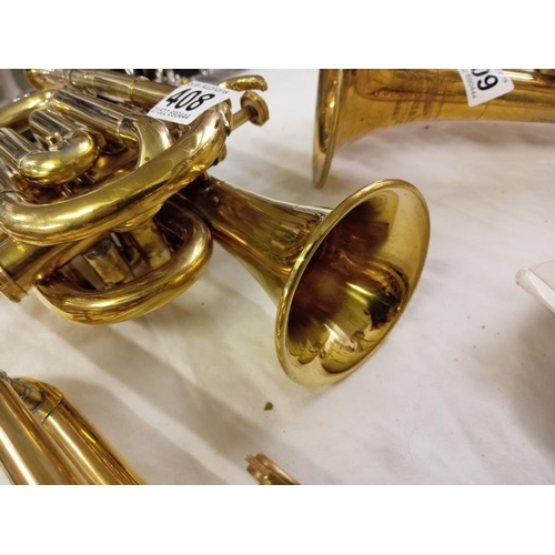 408 - A small brass cornet