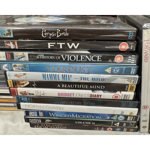 719 - A quantity of DVDs & CDs