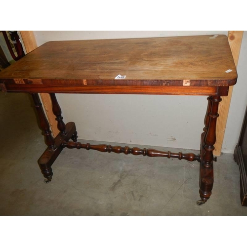 1446 - A Victorian rosewood stretcher base table. COLLECT ONLY.