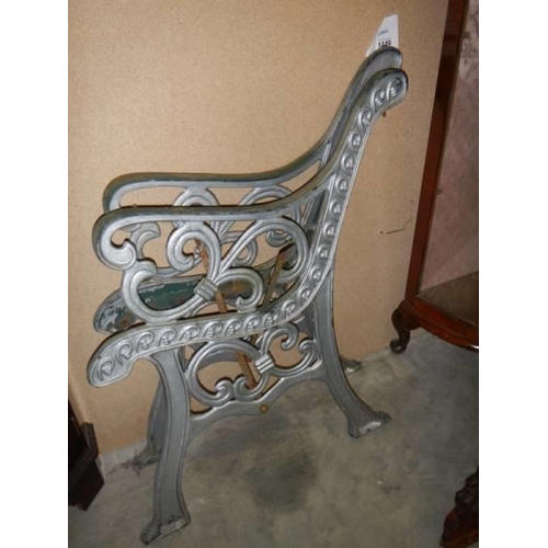 1449 - A pair of cast iron garden bench ends. COLLECT ONLY.