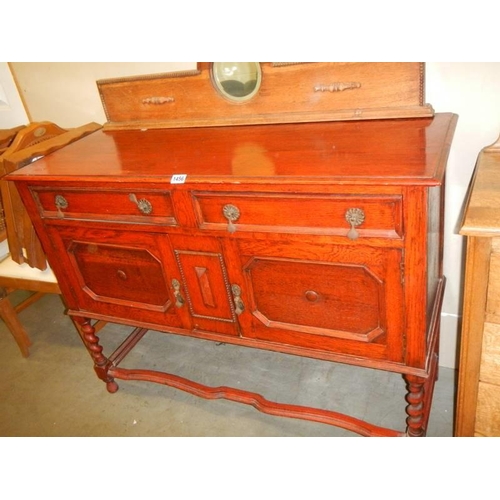 1456 - A mid 20th century oak sideboard. COLLECT ONLY.