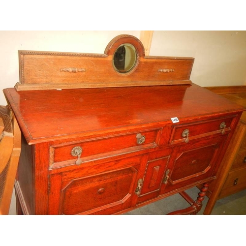 1456 - A mid 20th century oak sideboard. COLLECT ONLY.