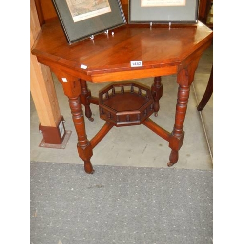 1482 - An octagonal mahogany occasional table. COLLECT ONLY.