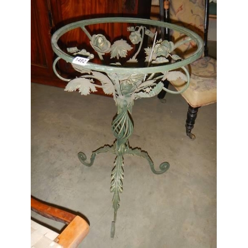 1492 - A decorative wrought table base. COLLECT ONLY.