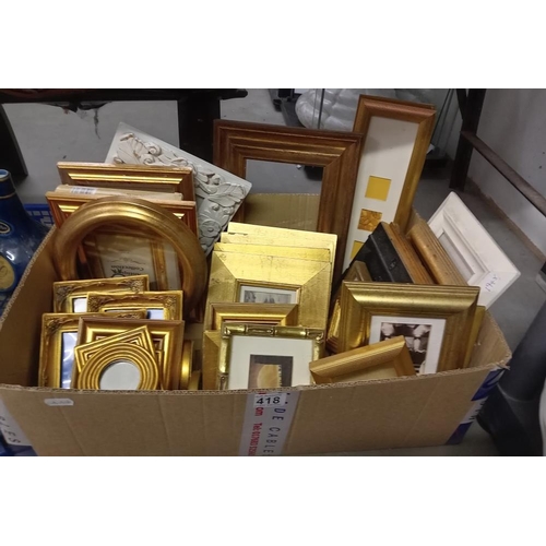 418 - A quantity of pictures & picture frames