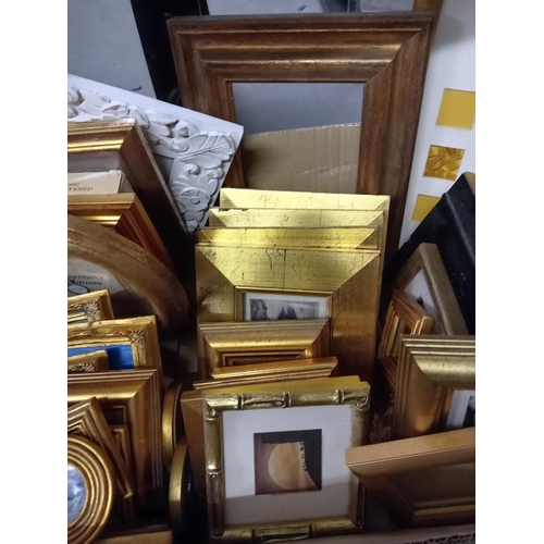 418 - A quantity of pictures & picture frames