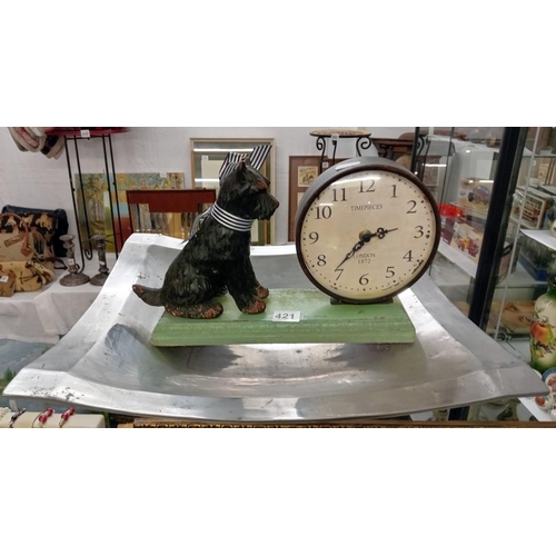 421 - A Timepiece clock with dog figure & a large square silver plate dish