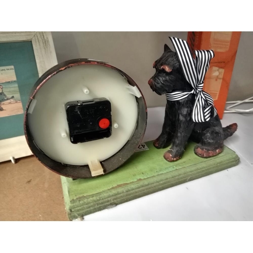 421 - A Timepiece clock with dog figure & a large square silver plate dish