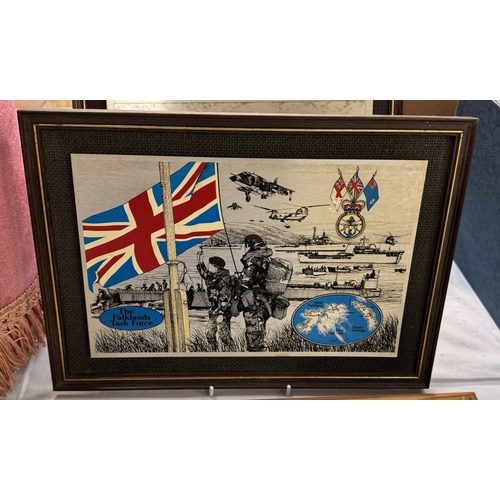 739 - A quantity of military framed images