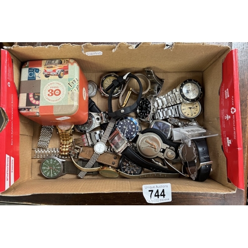 744 - A box of watches including new & boxed Fossil watch