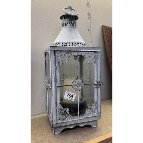 750 - A garden lantern & candle