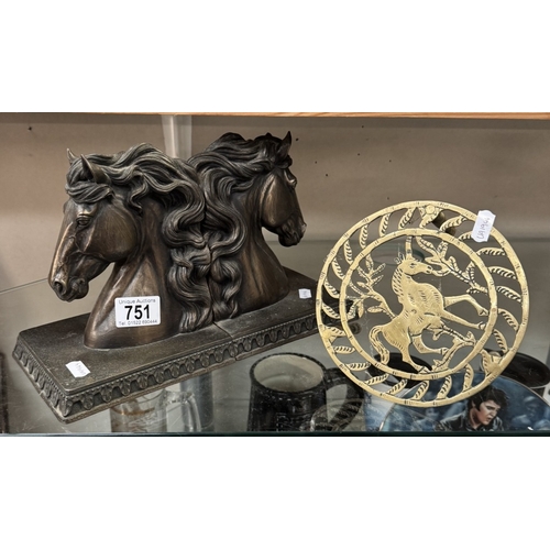 751 - A pair of horse bookends & a trivet