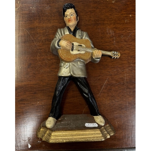 753 - A large quantity of Elvis mugs & clocks etc.