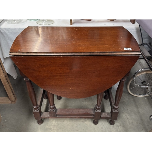 756 - An oak gateleg table