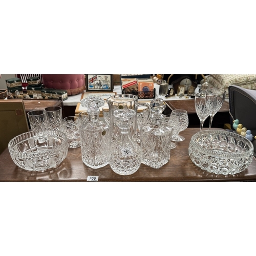 765 - A quantity of glass & crystal including decanters