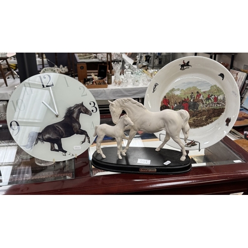 801 - A Royal Doulton spirit of affection white horse group glass wall clock & A large hunting scene meat ... 