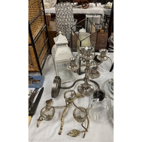 807 - A quantity of lighting including a pair of wall lights, candelabra etc