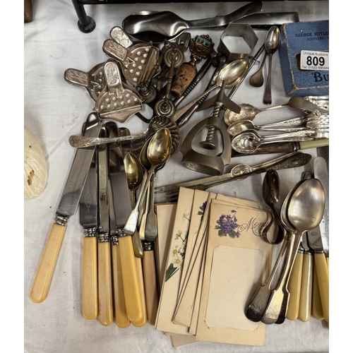 809 - A quantity of vintage plated cutlery etc including napkin rings