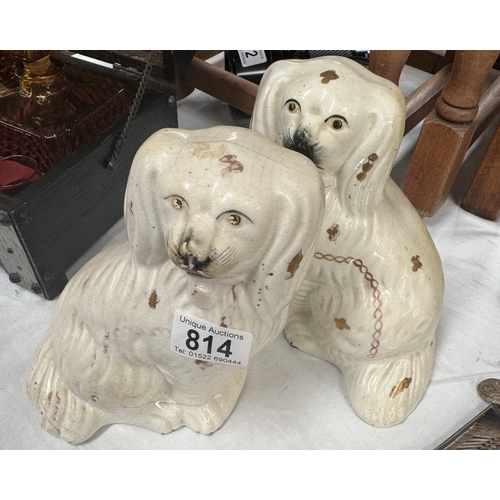 814 - Two pairs of mid 20th century Staffordshire spaniels.