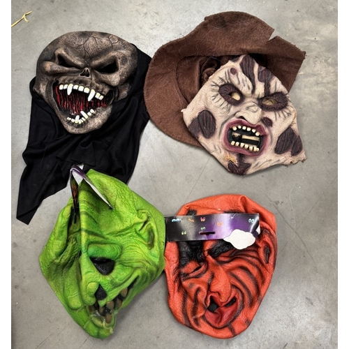 815 - A quantity of Halloween masks etc.