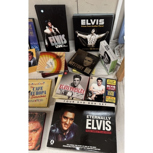 825 - A quantity of Elvis CD's & DVD's including Elvis the Searcher soundtrack