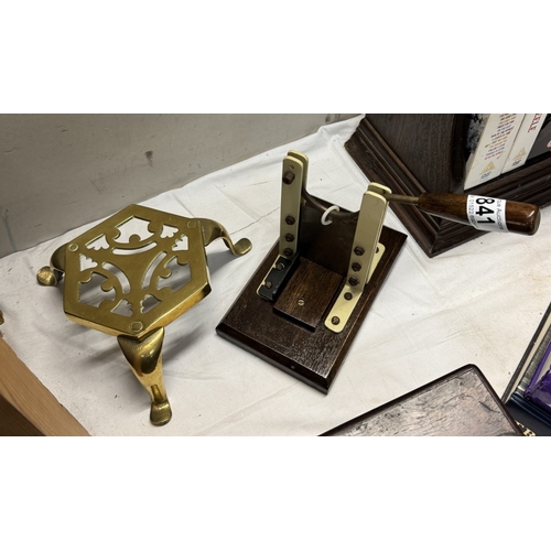 841 - A vintage tobacco cutter & a brass trivet