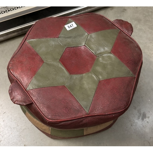 847 - An old leather pouffe. COLLECT ONLY.