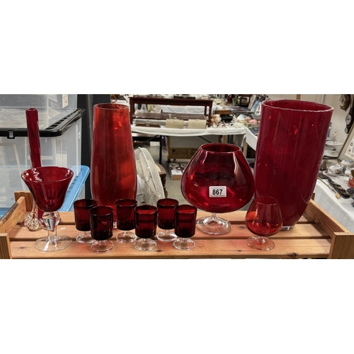 867 - A varied selection of ruby red coloured glass including vases, large brandy glass etc