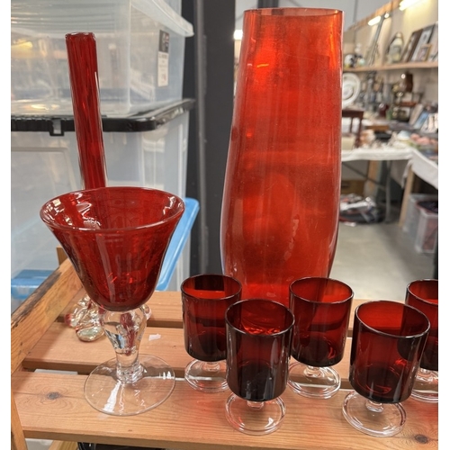 867 - A varied selection of ruby red coloured glass including vases, large brandy glass etc