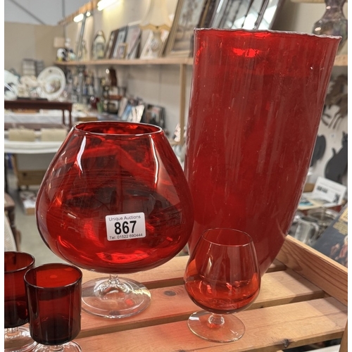 867 - A varied selection of ruby red coloured glass including vases, large brandy glass etc