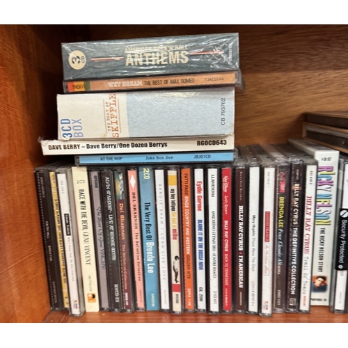 896 - A large quantity of CDs including Rock N Roll, Country, Easy etc