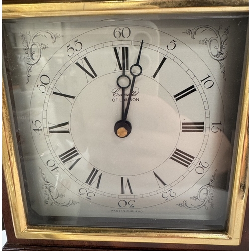 897 - A Comitti of London quartz mantel clock