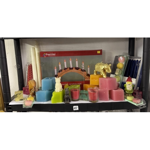 457 - 3 Shelves of candles & Christmas decorations