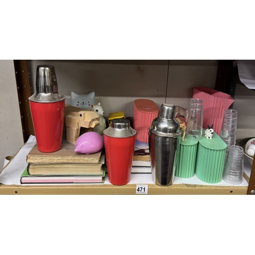 471 - A quantity of cocktail shakers, battery operated lights, books etc