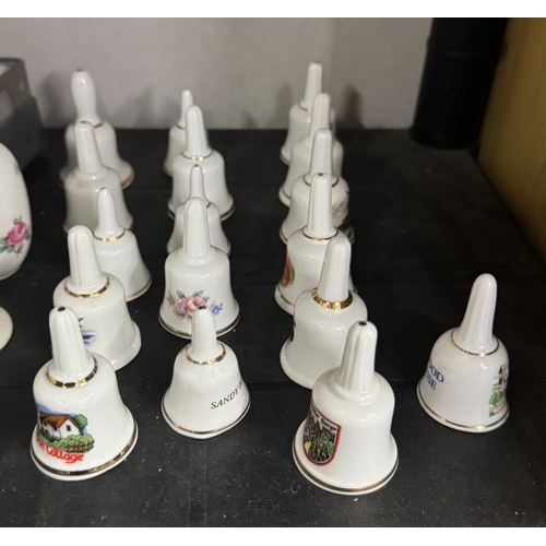 482 - A quantity of crested China and ceramic bells,