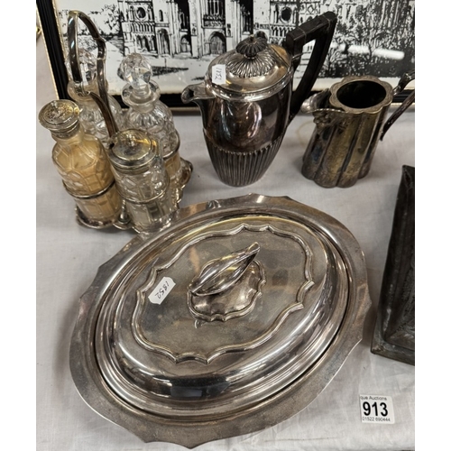 913 - A silver plated tureen, cruet set, candelabra, cheese dish etc