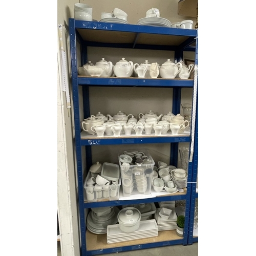 496 - A large collection of catering pots, plates etc