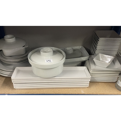 496 - A large collection of catering pots, plates etc