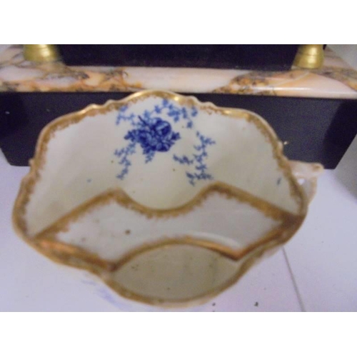 578 - An early 20th century blue and white moustache cup in good condition.