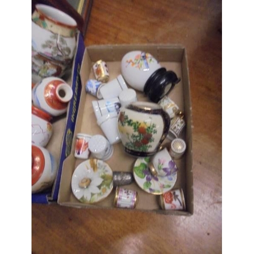 598 - A mixed lot of small Chinese vases, porcelain thimbles etc.,