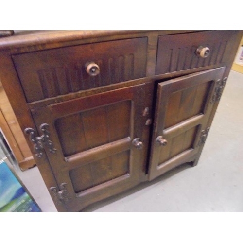 601 - A mid 20th century oak buffet sideboard. COLLECT ONLY.