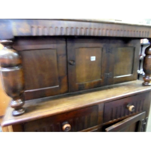 601 - A mid 20th century oak buffet sideboard. COLLECT ONLY.